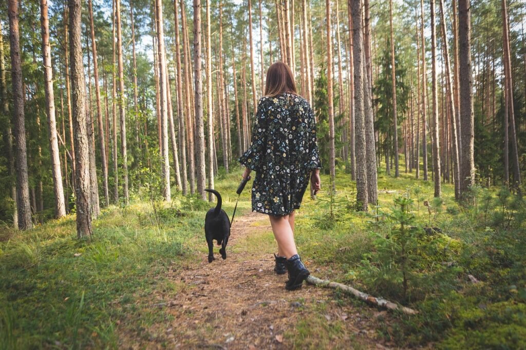 she walking with her dog in the morning 