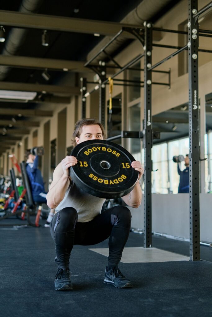 Man Doing Squats exercise.